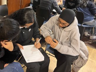 students from UCL doing the exam question activity