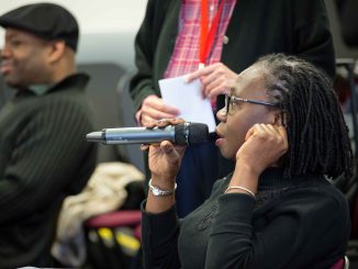 Woman asking question
